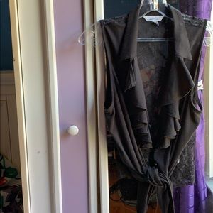 Black top with lace backing.